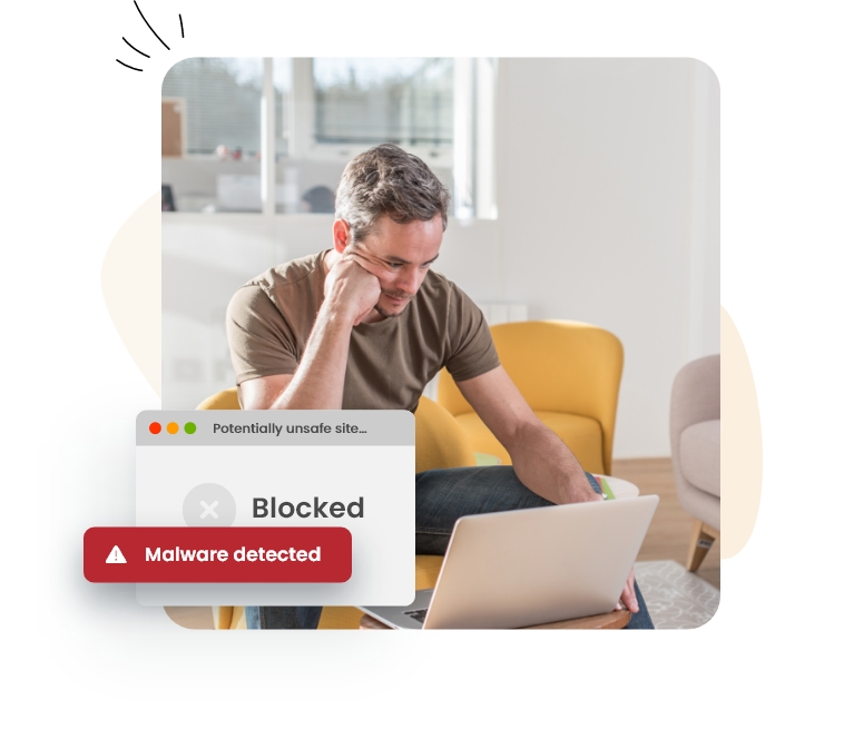 Das Bild zeigt einen Computerbildschirm mit der Meldung "blockierte Malware entdeckt".